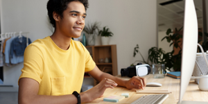 man at computer online learning